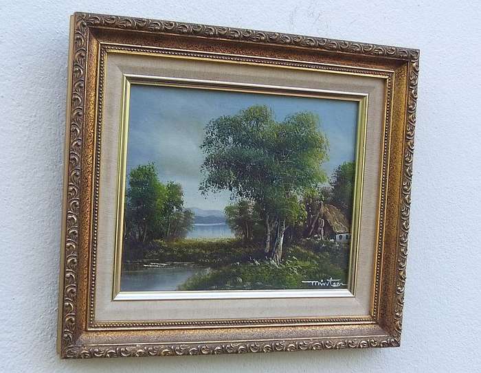 A Vintage original oil on board depicting a tranquil river scene signed by the artist ...Stunning !!