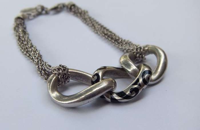 A SUPERIOR QUALITY DESIGNER MULTI STRAND BRACELET BY ESPRIT - STAMPED AND TESTED - HIGH VALUE