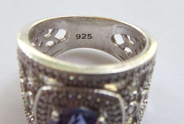 AN INCREDIBLE SOLID STERLING SILVER HALO RING SET WITH LOTS OF FACETED STONES !! MUST HAVE QUALITY !