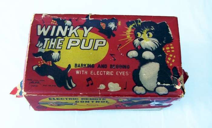 A RARE VINTAGE METAL AND PLASTIC REMOTE CONTROL TOY - WINKY THE PUP - GOOD COSMETIC CONDITION