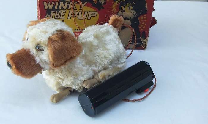 A RARE VINTAGE METAL AND PLASTIC REMOTE CONTROL TOY - WINKY THE PUP - GOOD COSMETIC CONDITION