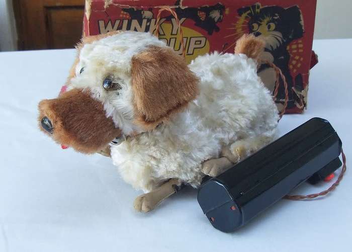 A RARE VINTAGE METAL AND PLASTIC REMOTE CONTROL TOY - WINKY THE PUP - GOOD COSMETIC CONDITION