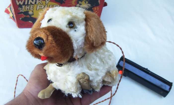 A RARE VINTAGE METAL AND PLASTIC REMOTE CONTROL TOY - WINKY THE PUP - GOOD COSMETIC CONDITION