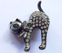 A vintage CAT brooche