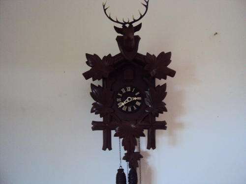 CUCKOO  CLOCK WITH DEER HEAD PEDIMENT  HUBERT HERR  GERMANY