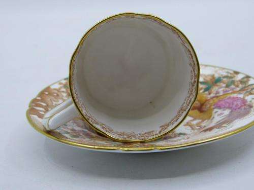 ROYAL CROWN DERBY DEMI TASSE AND SAUCER HAND PAINTED IN THE OLDE AVESBURY PATTERN A 73.