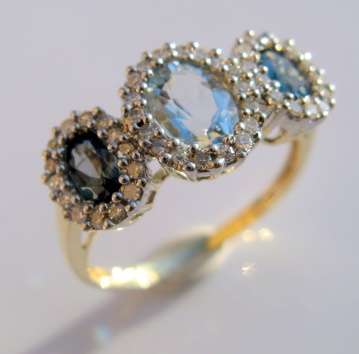 ***R23 230*** 9CT GOLD BLUE TOPAZ AQUAMARINE .50 DIAMOND RING