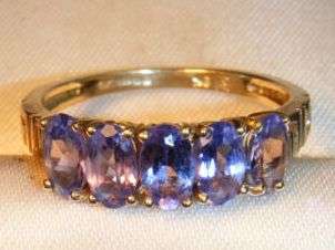 SUPERB 9CT GOLD TANZANITE ETERNITY RING SIZE J