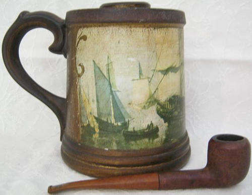VERY INTERESTING AND ATTRACTIVE PORCELAIN TOBACCO STORAGE " MUG " WITH PIPE.