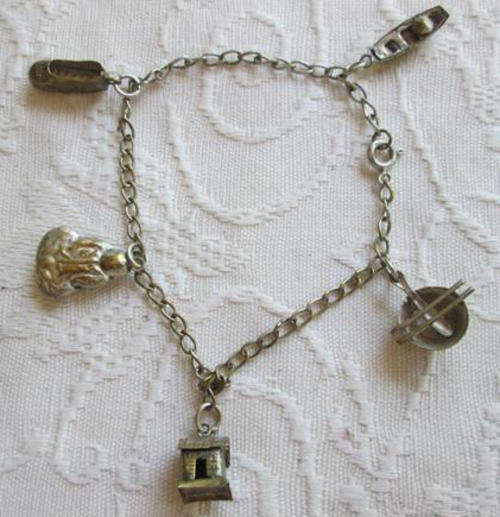 VERY VINTAGE, SILVER PLATED OVER BRASS ? CHINESE CHARM BRACELET