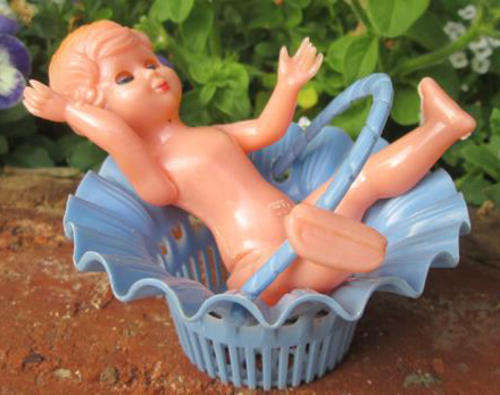 1950s  SMALL VINTAGE HARD PLASTIC DOLL, WITH VINTAGE HARD PLASTIC BASKET.