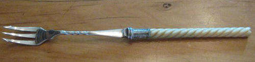 R1.00 FOR THIS INTERESTING AND COLLECTABLE, SILVER PLATE ? AND IVORY PICKLE FORK,