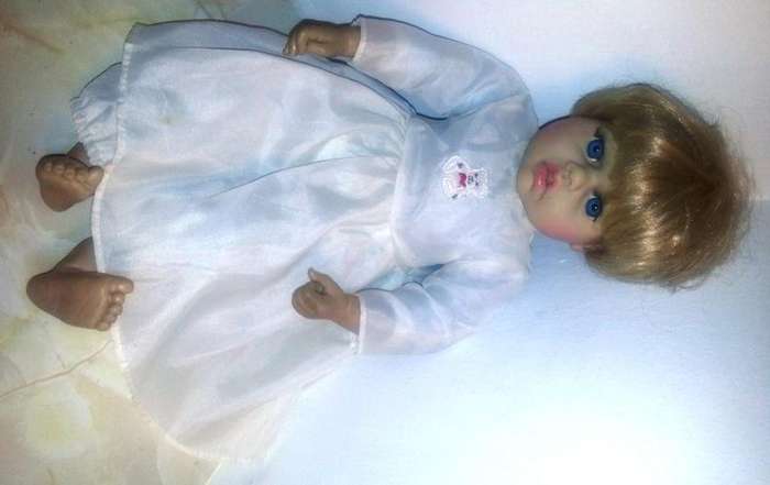COLLECTABLE VINYL DOLL...SHE IS JUST TO CUTE FOR WORDS