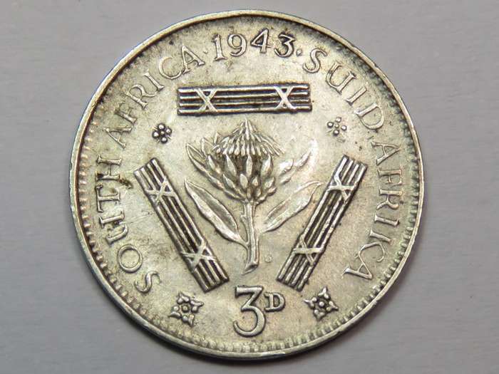 1943 tickey VF+ - Totally misaligned 43 - Some petals on right of protea missing