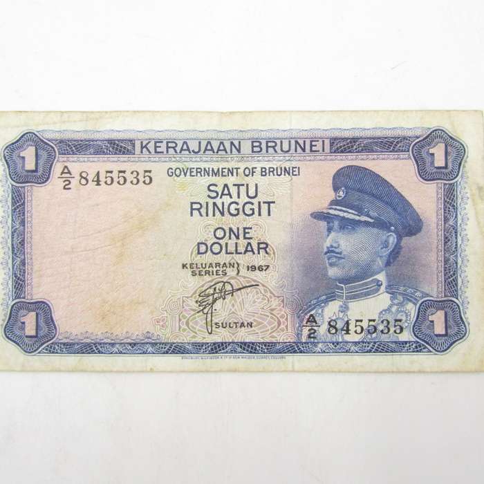 Brunei 1967 One dollar banknote well used