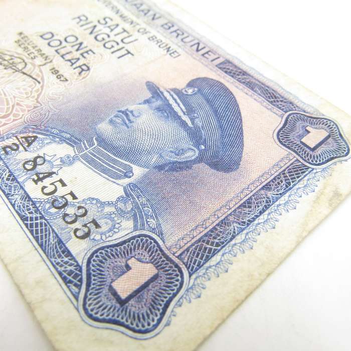 Brunei 1967 One dollar banknote well used