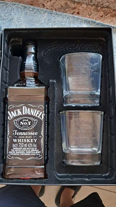 Jack Daniels 150th Anniversary Bottle in Tin with glasses