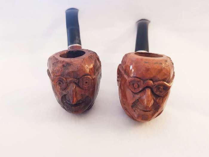 Briar Wood Pipes : a Pair carved with image of the Pope.