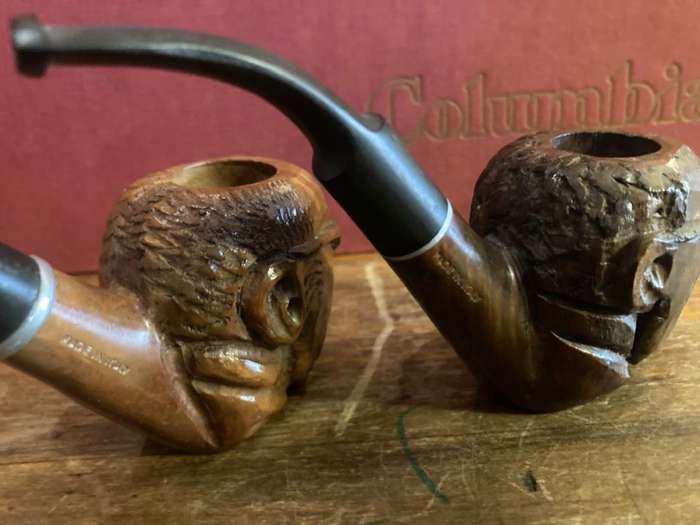 Briar Wood Pipes : a Pair carved with image of the Pope.