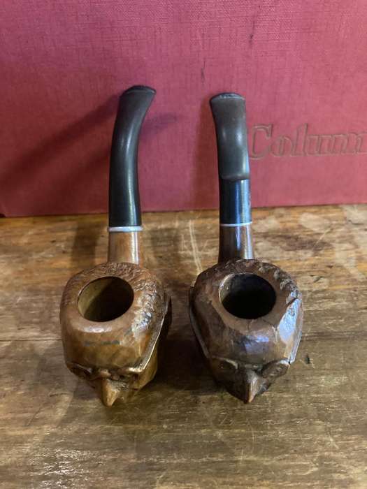 Briar Wood Pipes : a Pair carved with image of the Pope.