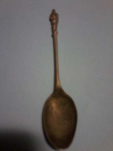 Very old sugar spoon with Jesus on top