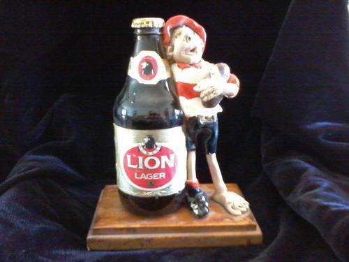 Old lion lager bottle and player