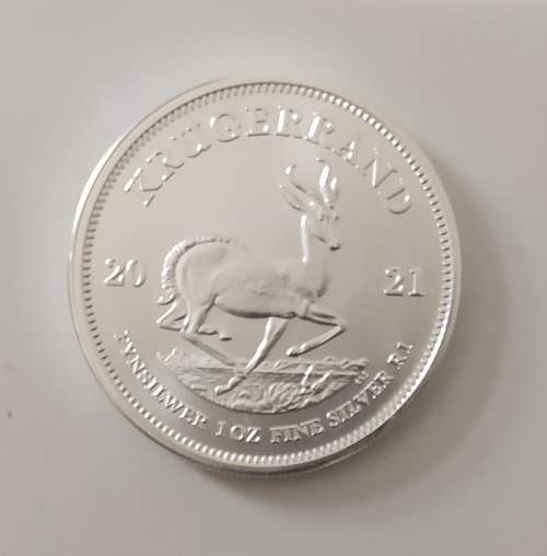{ECONO BID} 2021 SILVER ONE OUNCE KRUGERRAND (UNC) IN CAPSULE