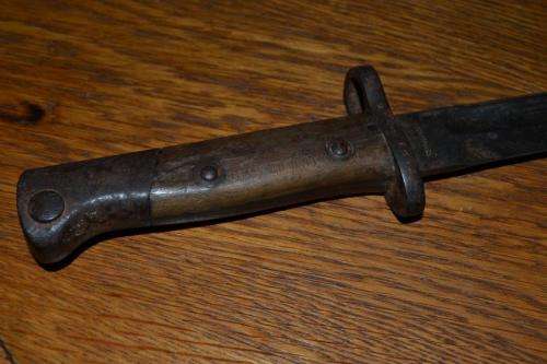 Portuguese 1904 Mauser Bayonet. Blade is sharpened and missing the Scabbard.