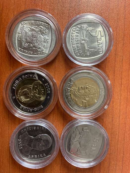 6 MANDELA COINS IN CAPSULES * 1994 inauguration (circulated) 2000 smiley (circ) 2008 birthday (unc)