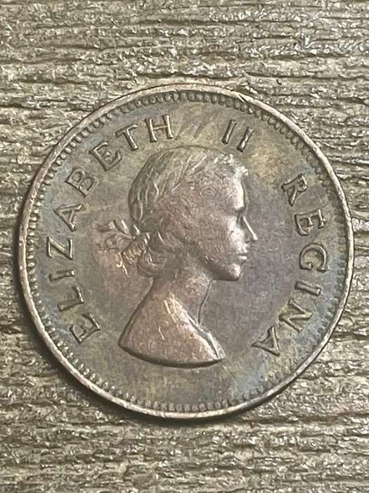 1955 *** 1/2 Penny *** the top stains can removed as coin better than picture