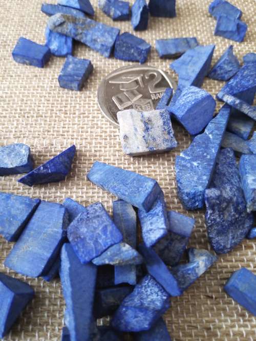 Lapis Lazuli `chips`/small pieces - price is for one piece. You will receive a random selected one