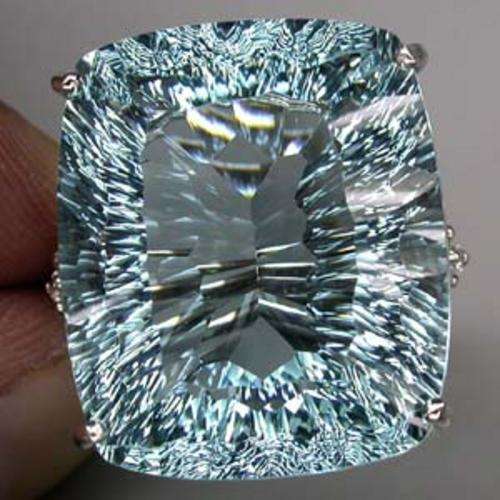 MAGNIFICENT AQUA BLUE AQUAMARINE CONCAVE CUT (MAIN STONE 33.83CT), SOLID 925 STERLING SILVER RING
