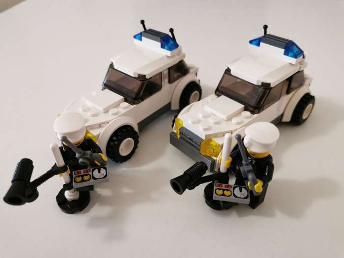 Pair of Lego city police cars no. 7236 auction for two cars as per photo.