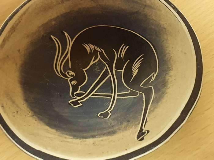 Round Pottery Bowl with Animal Design - width 10cm height 2cm