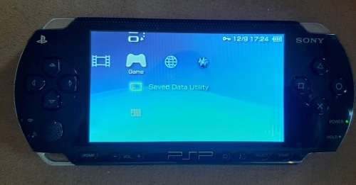 PSP 1001 ( Very Good condition) + 4 games