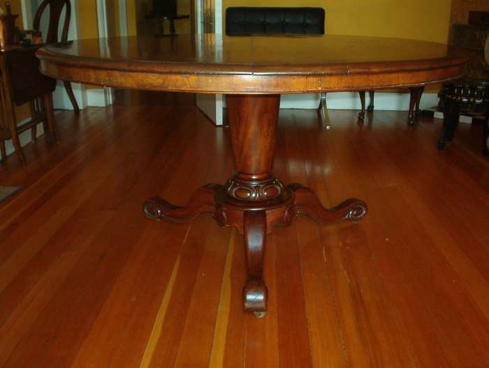 Antique tilt-top dining table