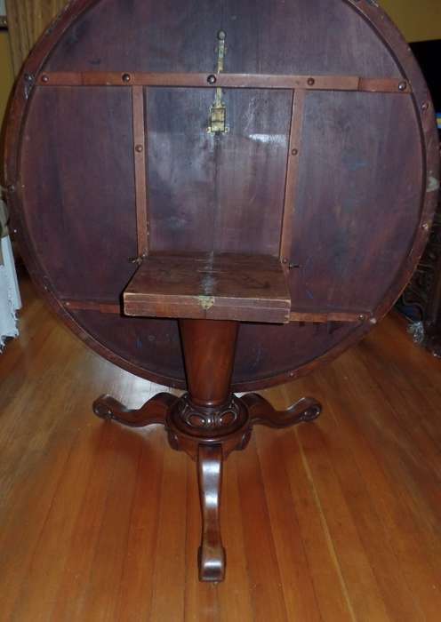Antique tilt-top dining table