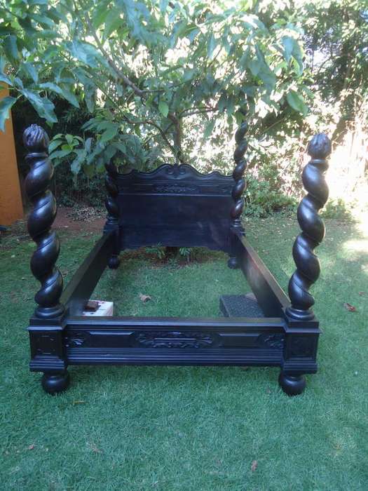 ANTIQUE HEAVILY CARVED FOUR POSTER BED