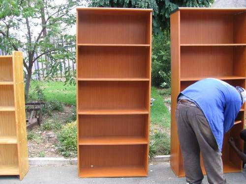 ## A TALL CHERRY WOOD BOOKSHELF WITH ADJUSTABLE SHELVES  ##