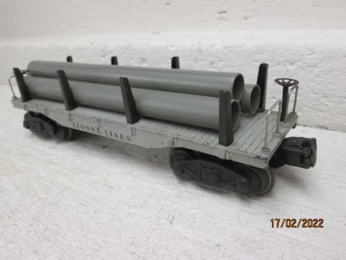 O SCALE : LIONEL : FLAT CAR WITH PIPE LOAD