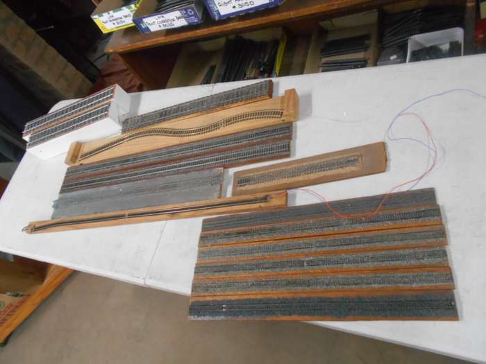 VARIOUS DISPLAY TRACKS - MOUNTED ON VARIOUS WOODEN ITEMS - X15 PIECES