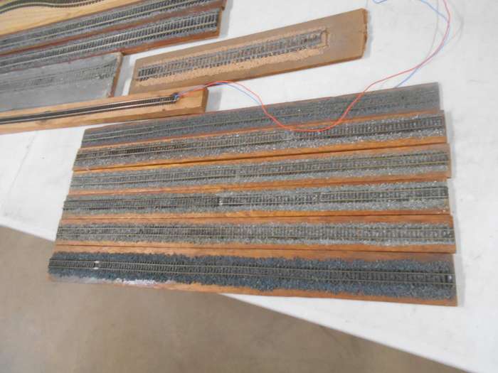 VARIOUS DISPLAY TRACKS - MOUNTED ON VARIOUS WOODEN ITEMS - X15 PIECES