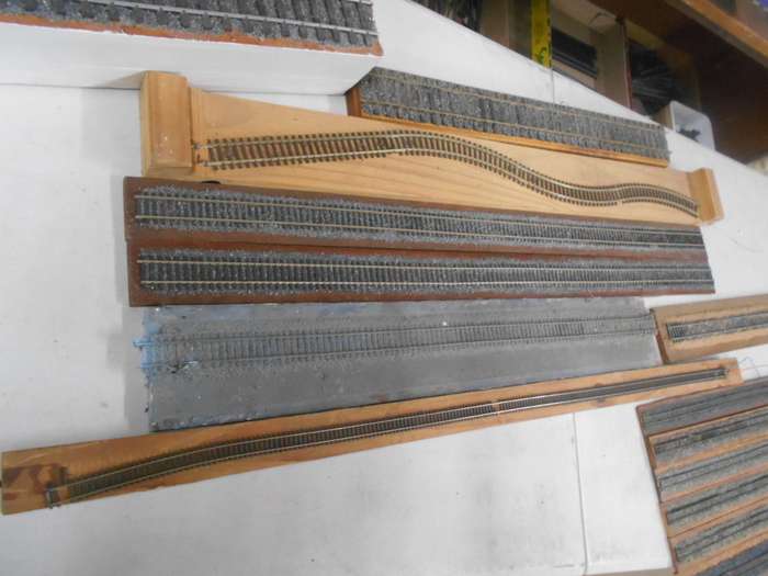 VARIOUS DISPLAY TRACKS - MOUNTED ON VARIOUS WOODEN ITEMS - X15 PIECES