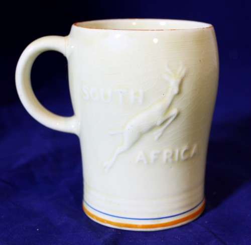 Crown Devon - embossed 1947 Royal visit to RSA mug