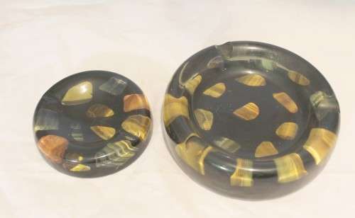 Pair of semi precious stone ashtrays in molded plastic