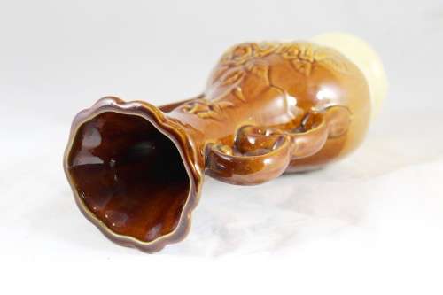 Tall stoneware vase with embossing