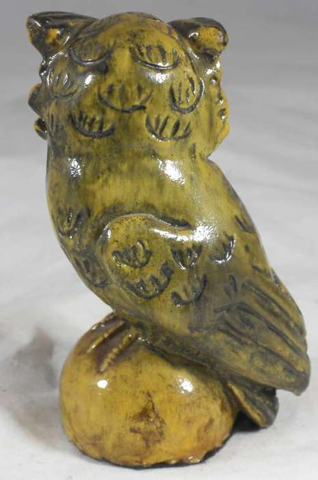 Stoneworks JHB - brown owl on a round pedestal