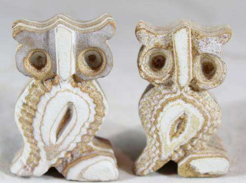 Pair of miniature sandstone owls