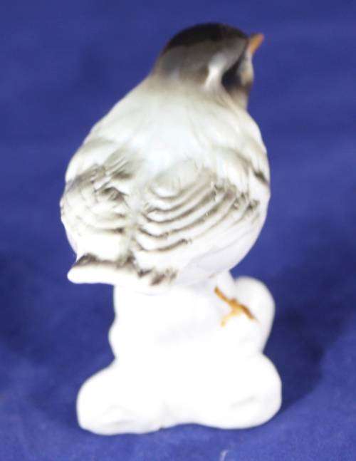 Bird on a rock - bone China