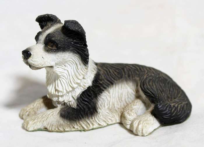Regency fine arts - dog lying down